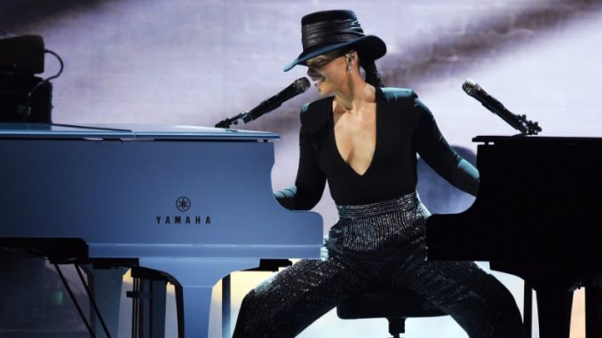 Alicia Keys Steals The Show Playing Two Pianos at Once