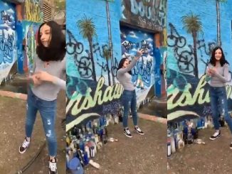 Disrespectful Chick Caught Vandalizing Nipsey Hussle's Mural & Takes Selfies
