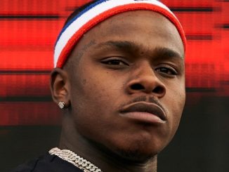 DaBaby Throws A Quick Jam At Fan Who Tries To Grab His Chain
