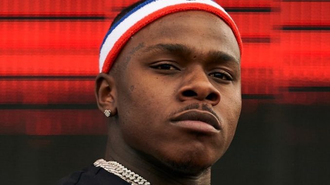 DaBaby Throws A Quick Jam At Fan Who Tries To Grab His Chain