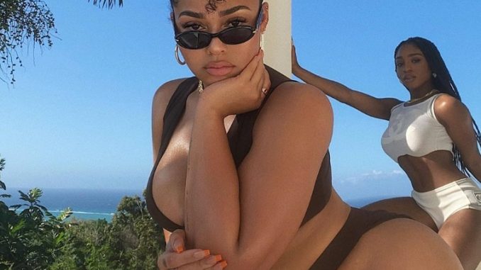 Jordyn Woods Rocks Fans’ World With These Revealing Photos In Tiger-Striped Swimsuit