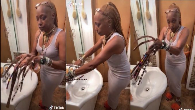 Woman Shows How She Washes Her Hands With Extremely Long Nails