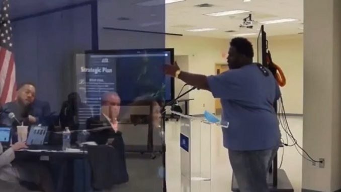 Video Shows Man Blasts School Board Member For Shopping Online During Meeting
