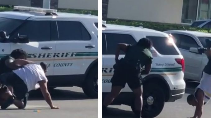 Video Shows Florida Man Escape Cop's Hold And Do A Cartwheel While Fleeing