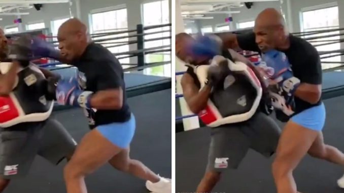 Mike Tyson Nearly Knocks His Trainer's Head Off During Workout