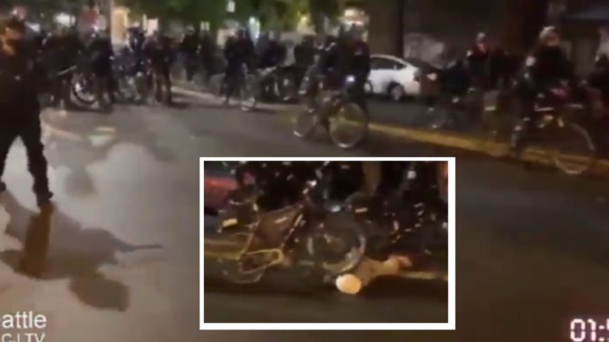 Video Shows Cop Appear To Roll Bike Over Injured Man's Head