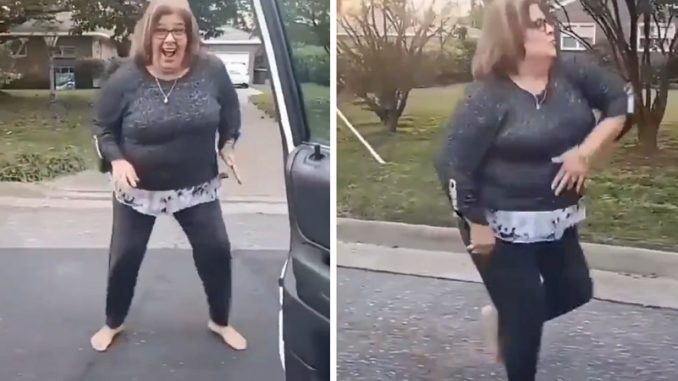 Woman Is Jammin' To 'More Bounce To The Ounce' In The Middle of The Street