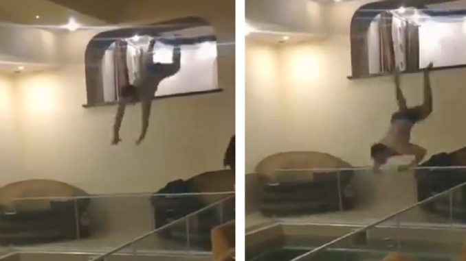 Guy Tries To Do A Diving Stunt And His Face Hits...All Glass