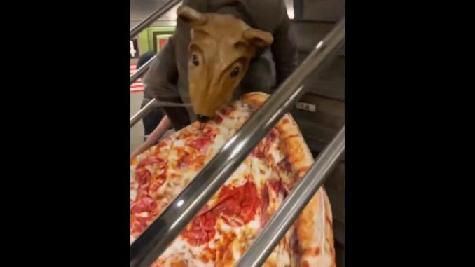 Only In New York Will A Person Dress Up As A Rat And Drag A Slice Of Pizza