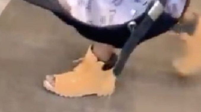 Whose Man Is This Rockin' 'Toes Out Timbs'