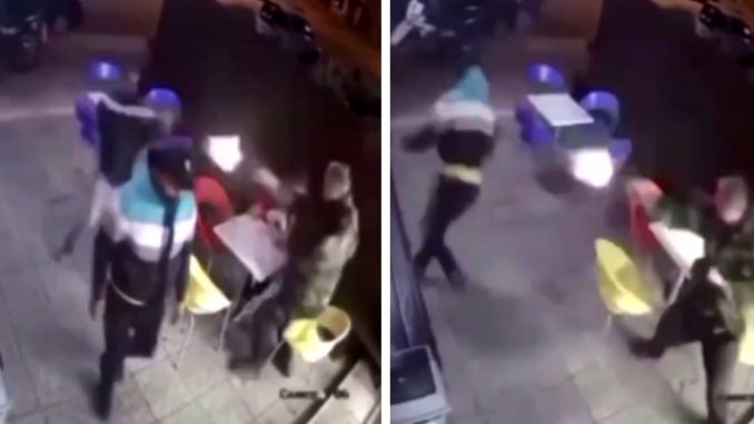 Video Shows Woman Casually Eating Her Ice Cream As Man Opens Fire On Two Men
