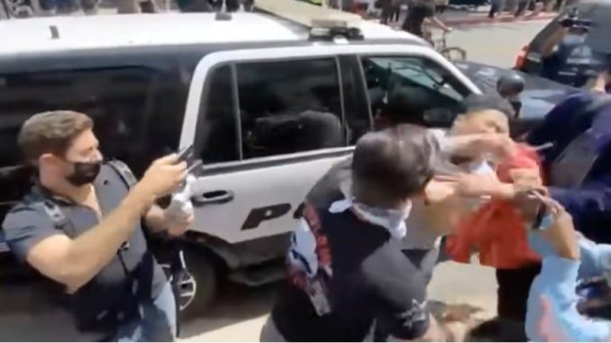 Man With Swastika Tattoo Punches A Asian Man During White Lives Matter Rally in Viral Video