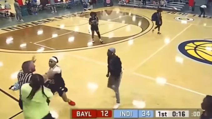 Referee Gets Body Slammed Hard During B-Ball Game