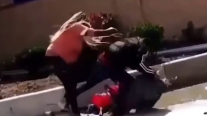 Woman Attacks Street Vendor And Steals His Flowers