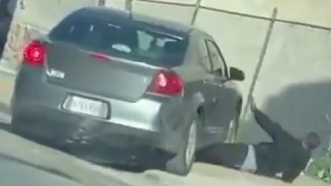 Woman Slow Rolls Over Her Man With Her Car