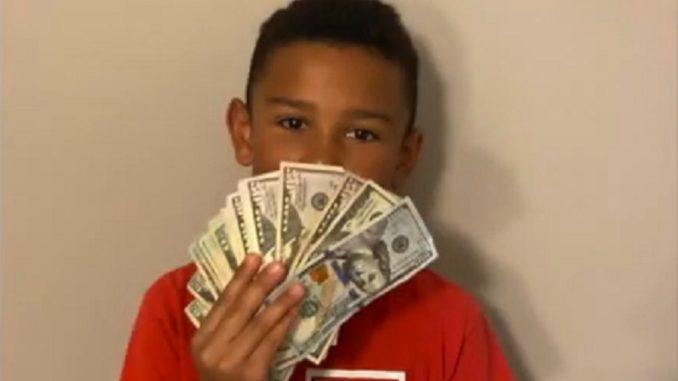 9-Year-Old Gets A Big Payday After Finding $5,000 While Cleaning Family's Used Car