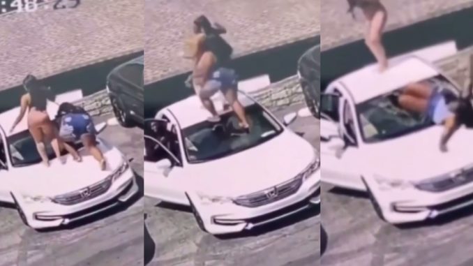 Woman Falls Hard After Stepping On Car Windshield