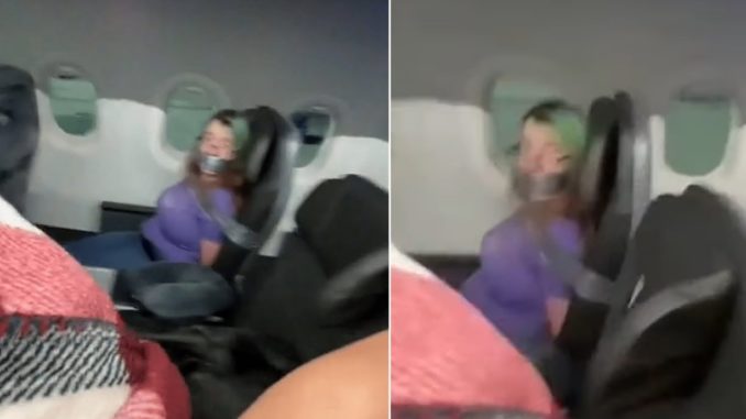 Video Shows Woman Duct-Taped To Seat on American Airlines After Trying To Open Airplane Door