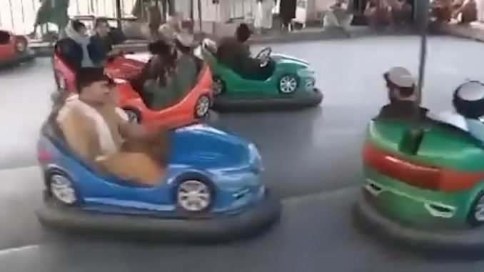 Taliban Men Enjoy The Bumper Cars at Amusement Park After Capturing Afghanistan