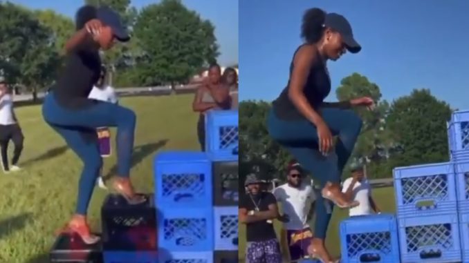 Woman Take On The 'Crate Challenge' in Heels
