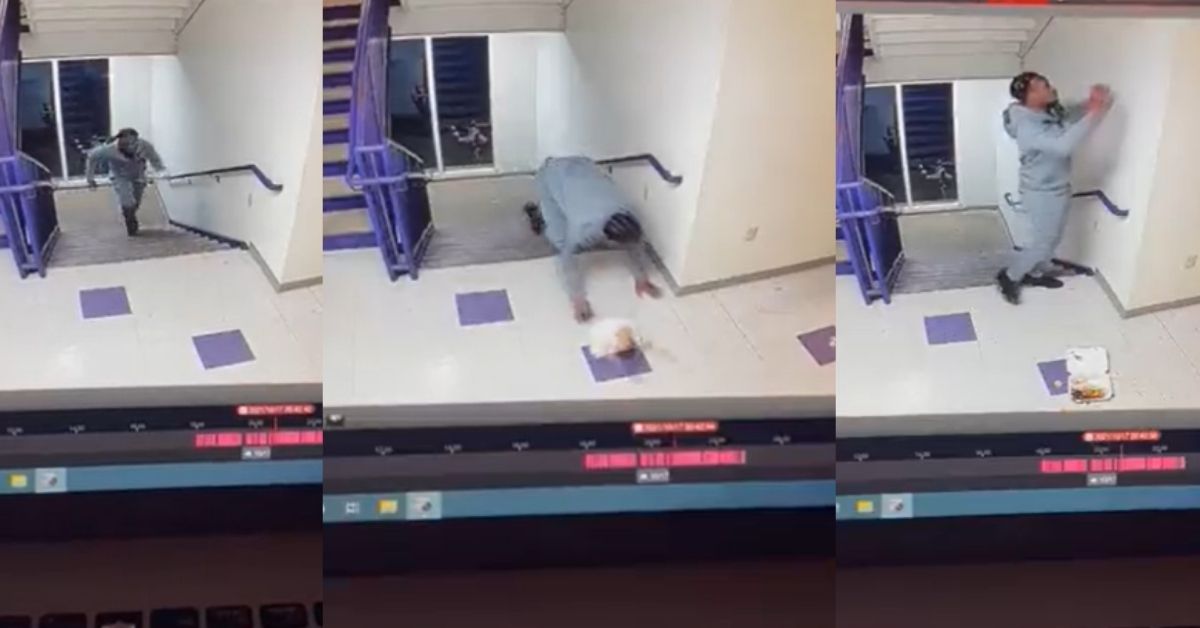 Viral Surveillance Video Captures Guy Trip Up The Stairs And Spill All...His Food