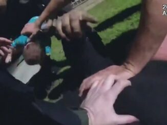 Bodycam Video Shows Man Carrying Baby Son Being Tackled By LAPD Officers During Foot Chase
