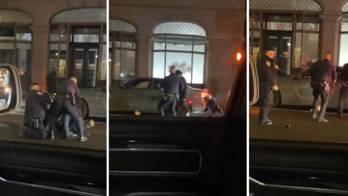 What Just Happened: Viral Video Shows Man Break Away From 3 Cops and Drive Off