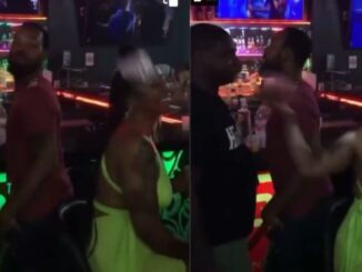 Guy Pours Drink on Woman After He Doesn't Get Her Number...And She Wallops His Azz