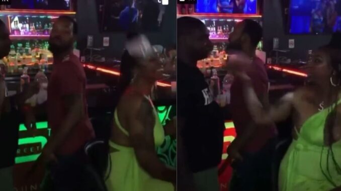 Guy Pours Drink on Woman After He Doesn't Get Her Number...And She Wallops His Azz