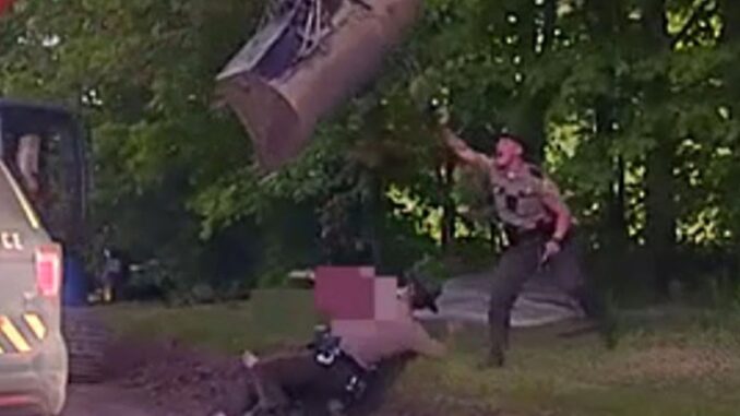 Watch: Father Uses Excavator to Stop Troopers from Arresting His Son