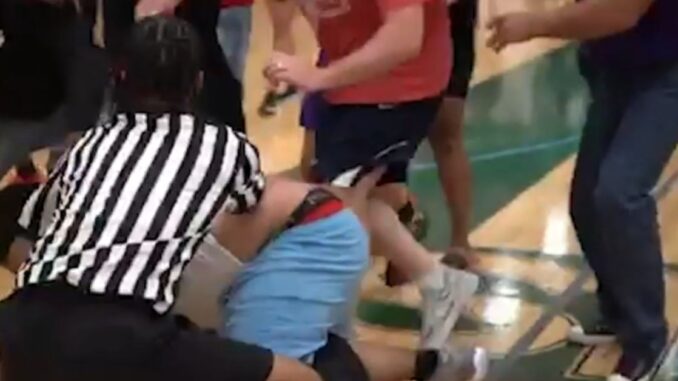 AAU Ref Gets Jumped After Altercation With Coach During Game